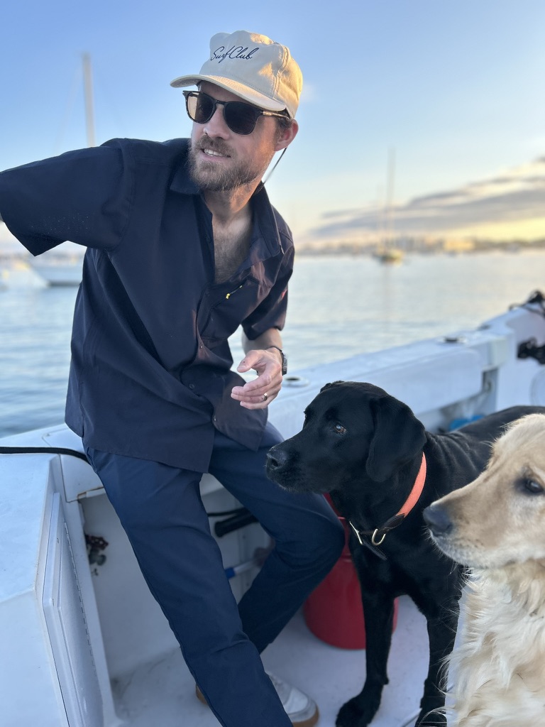 Mike Farwell photographing from a boat in Salem Harbor Massachusetts