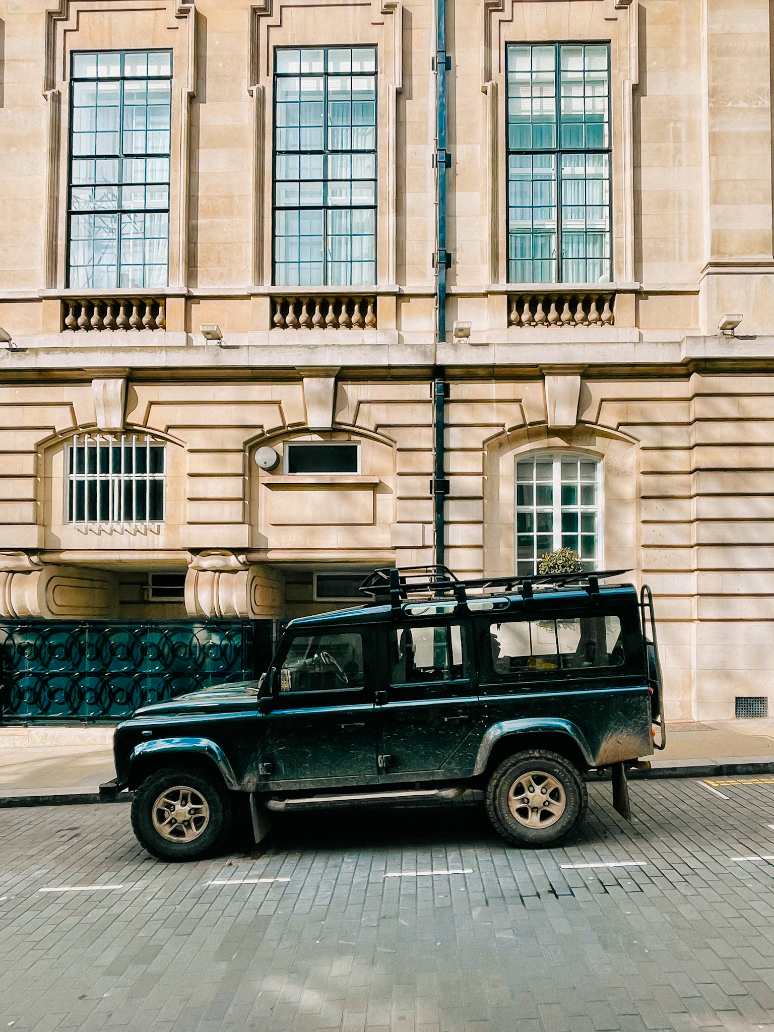 Land Rover Defender parked on a street in Mayfair London