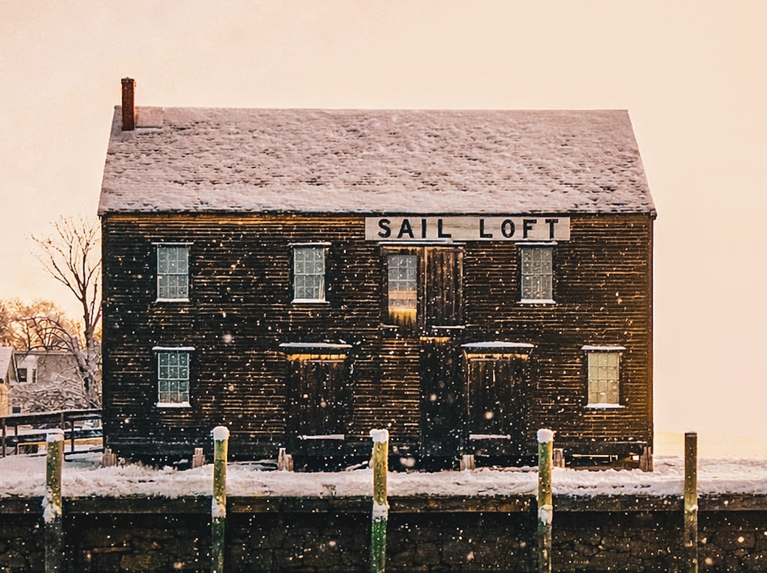 The Pedrick Store House (Sail Loft) beside Derby Wharf in winter snow, Salem Massachusetts