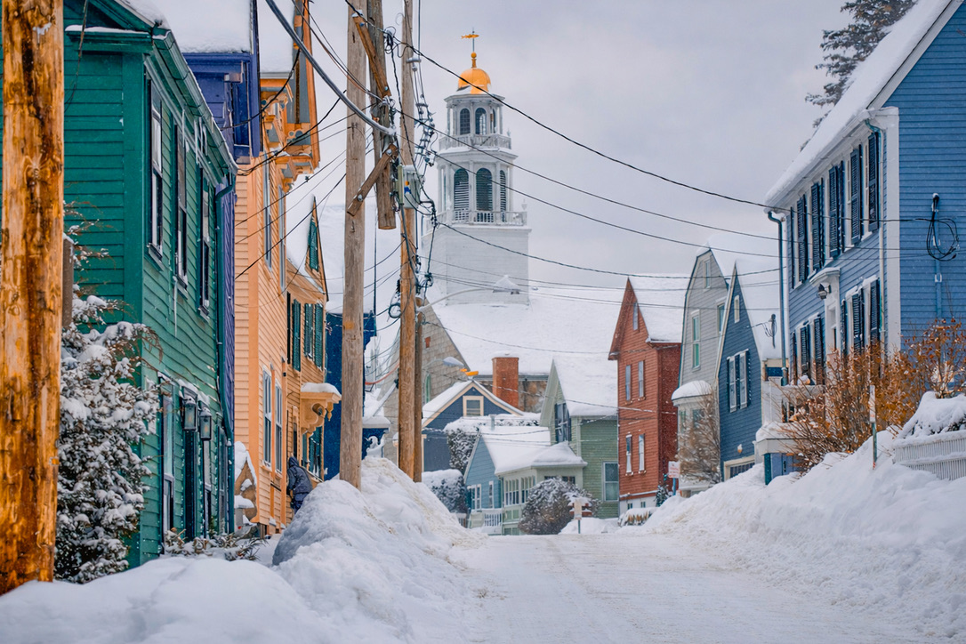 Snowy street in Marblehead, Massachusetts at dusk